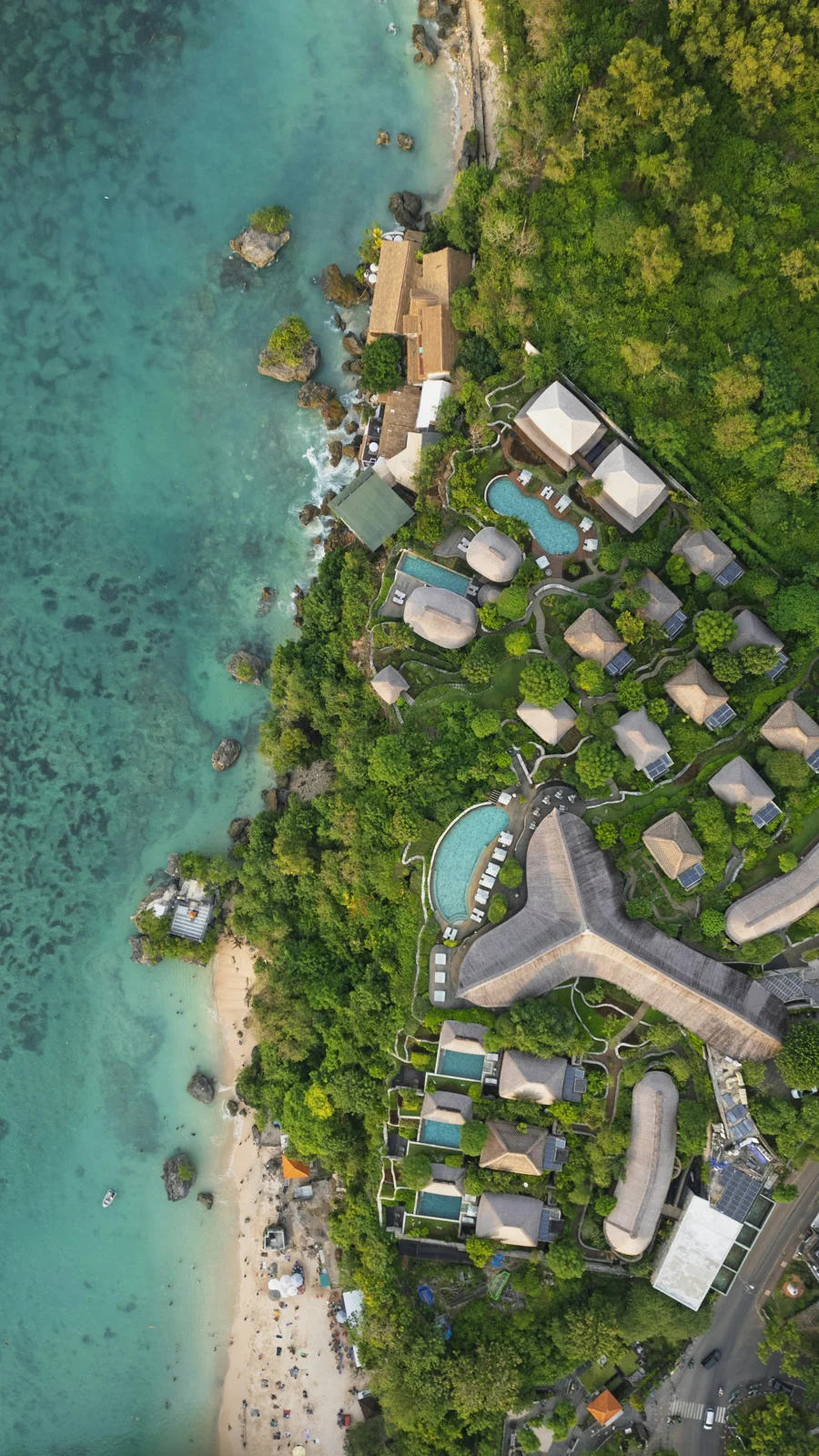 An aerial view of a tropical coastal resort in Bali