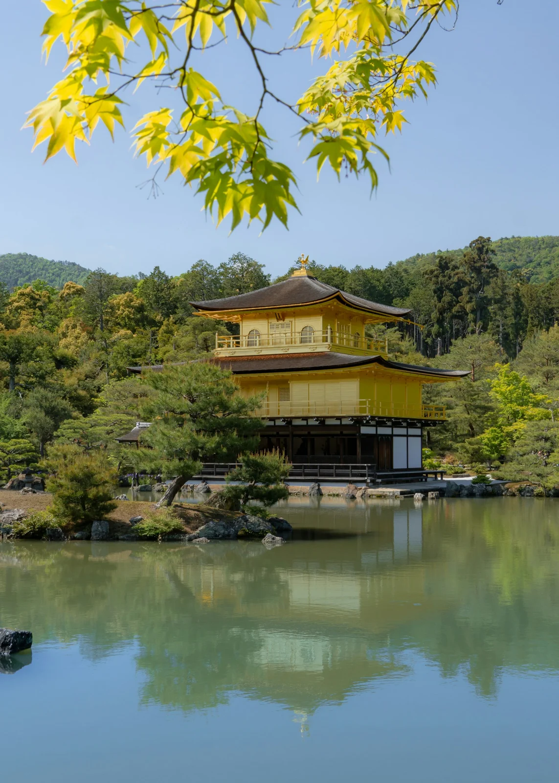 Kinkaku-ji temple reflected in a pond in Kyoto, Japan